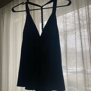 Black flowing tank blouse.